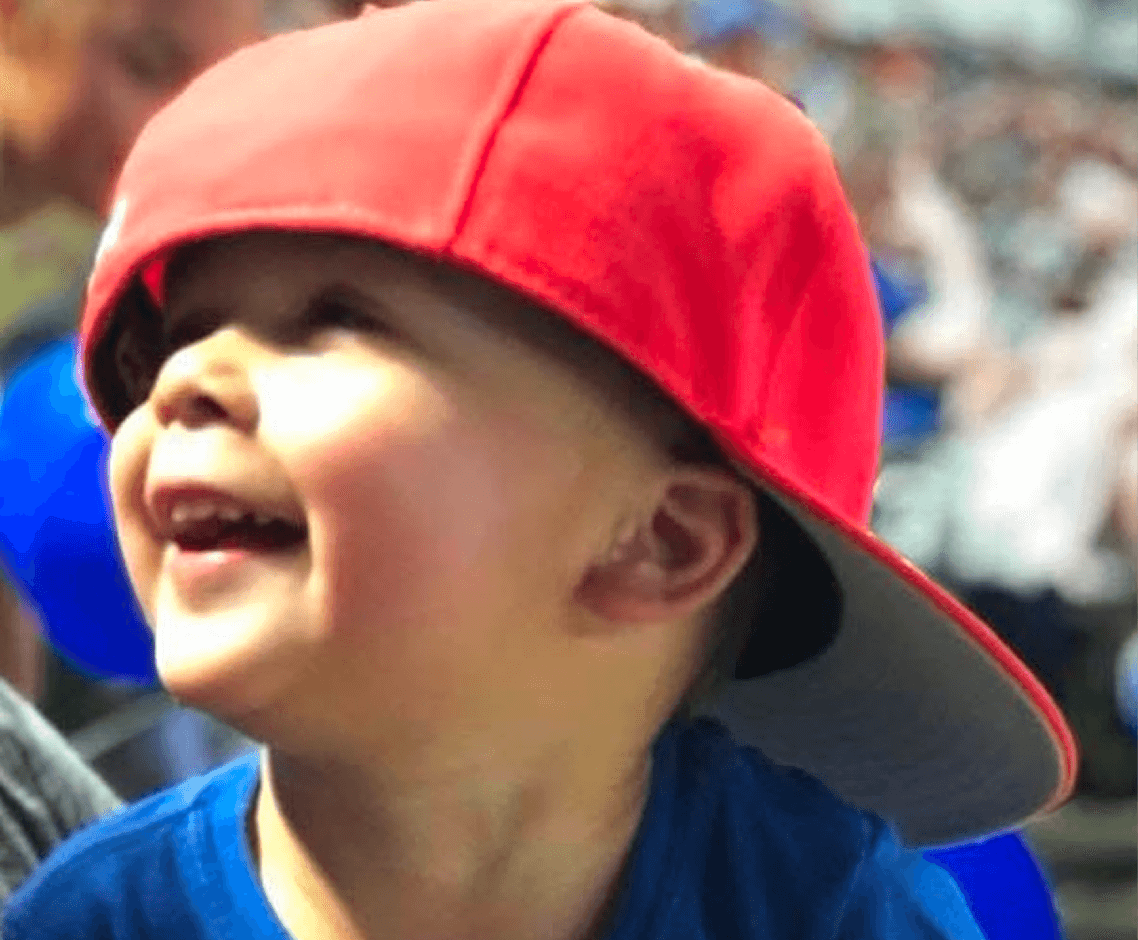 Joyful kid with sideways cap